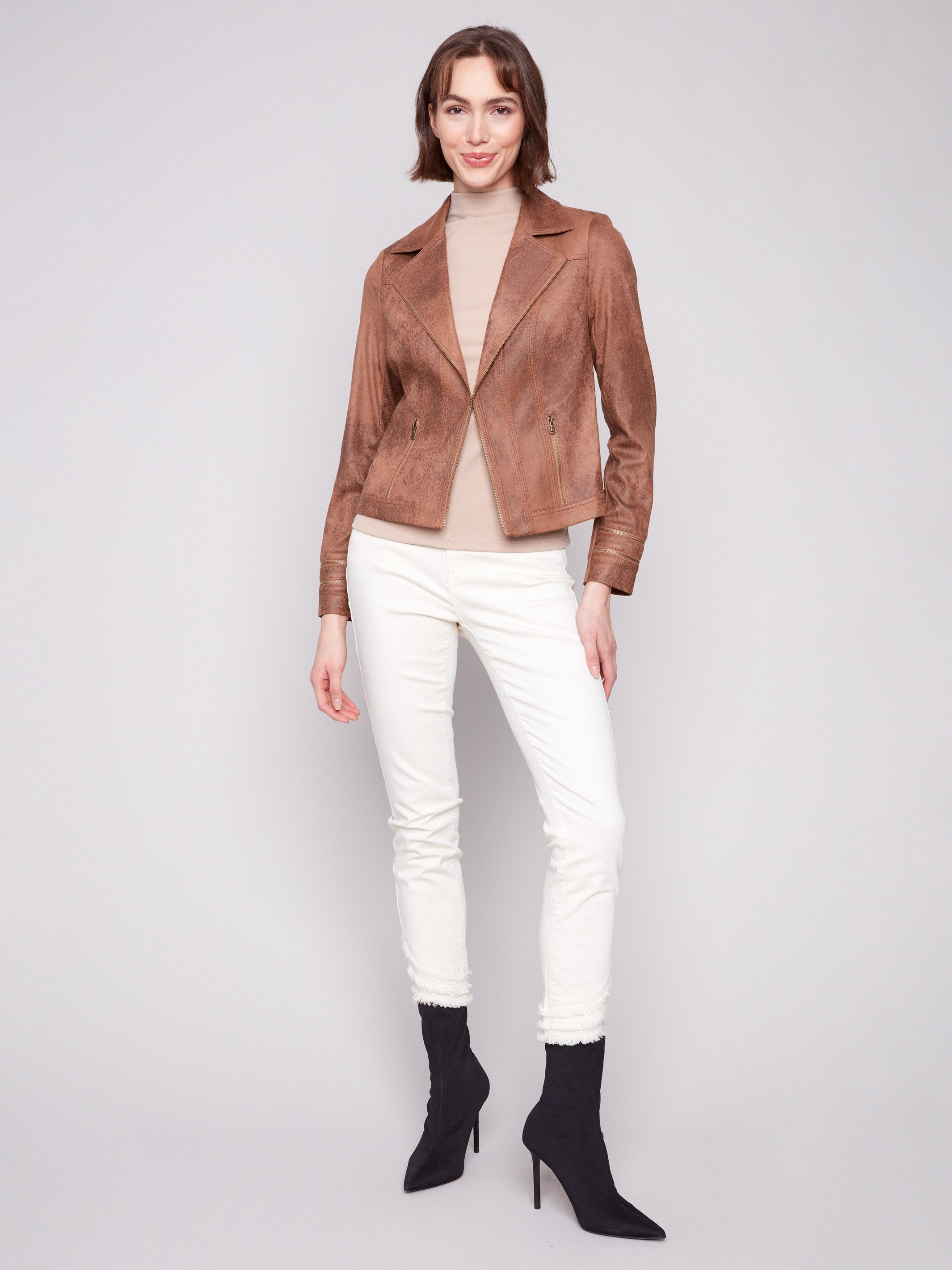 Chic truffle jacket with elegant zipper details and a sophisticated faux leather finish by Charlie B.