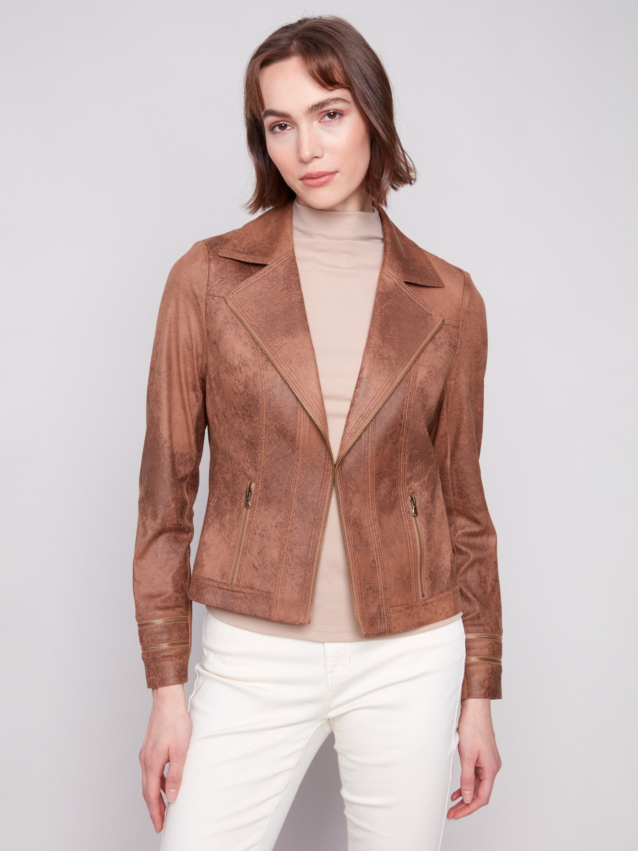 Sophisticated truffle jacket designed with a classic lapel collar and refined faux leather texture by Charlie B.