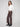 Elegant mocha pants designed with convenient front welt pockets for added functionality by Charlie B.