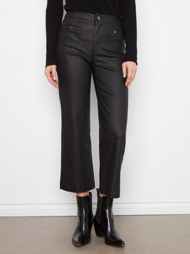 These ankle-length pants feature front welt pockets, blending functionality with fashion effortlessly by Charlie B.