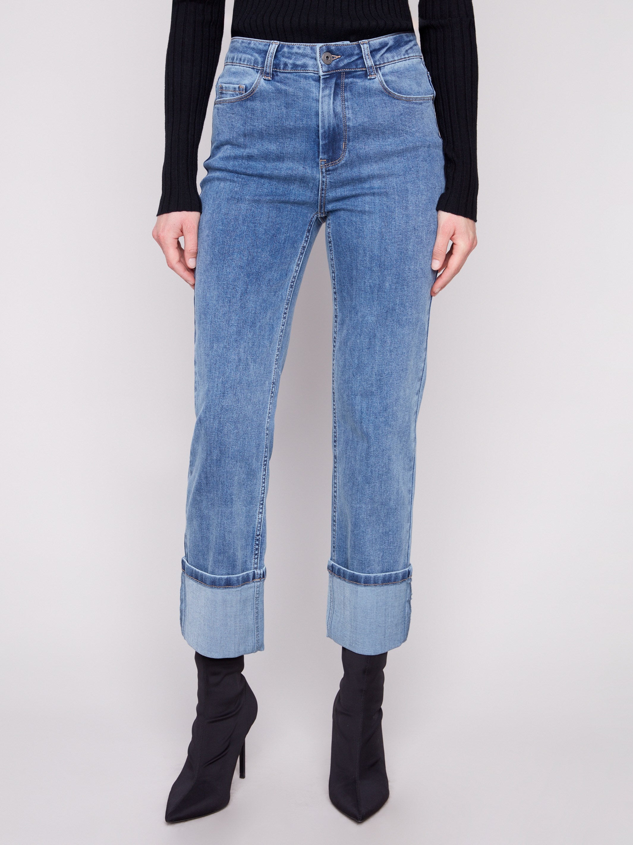 Blue cropped length jeans featuring a classic five-pocket design, ideal for casual outings by Charlie B.