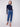Indigo straight leg jeans with wide cuffs, featuring a classic five-pocket design and button closure by Charlie B.