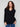 Sophisticated V-neck sweater in black with unique button details for added flair by Charlie B.