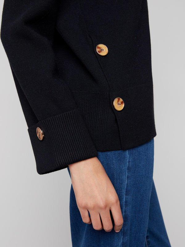 Stylish black sweater with eye-catching buttons on the sleeves, enhancing its modern appeal by Charlie B.