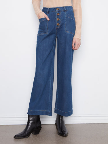 Ankle-length denim jeans with button closure and patch pockets, offering both style and functionality by Charlie B.