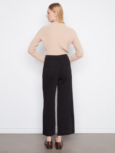 Chic black pants designed for comfort with a button closure by Charlie B.