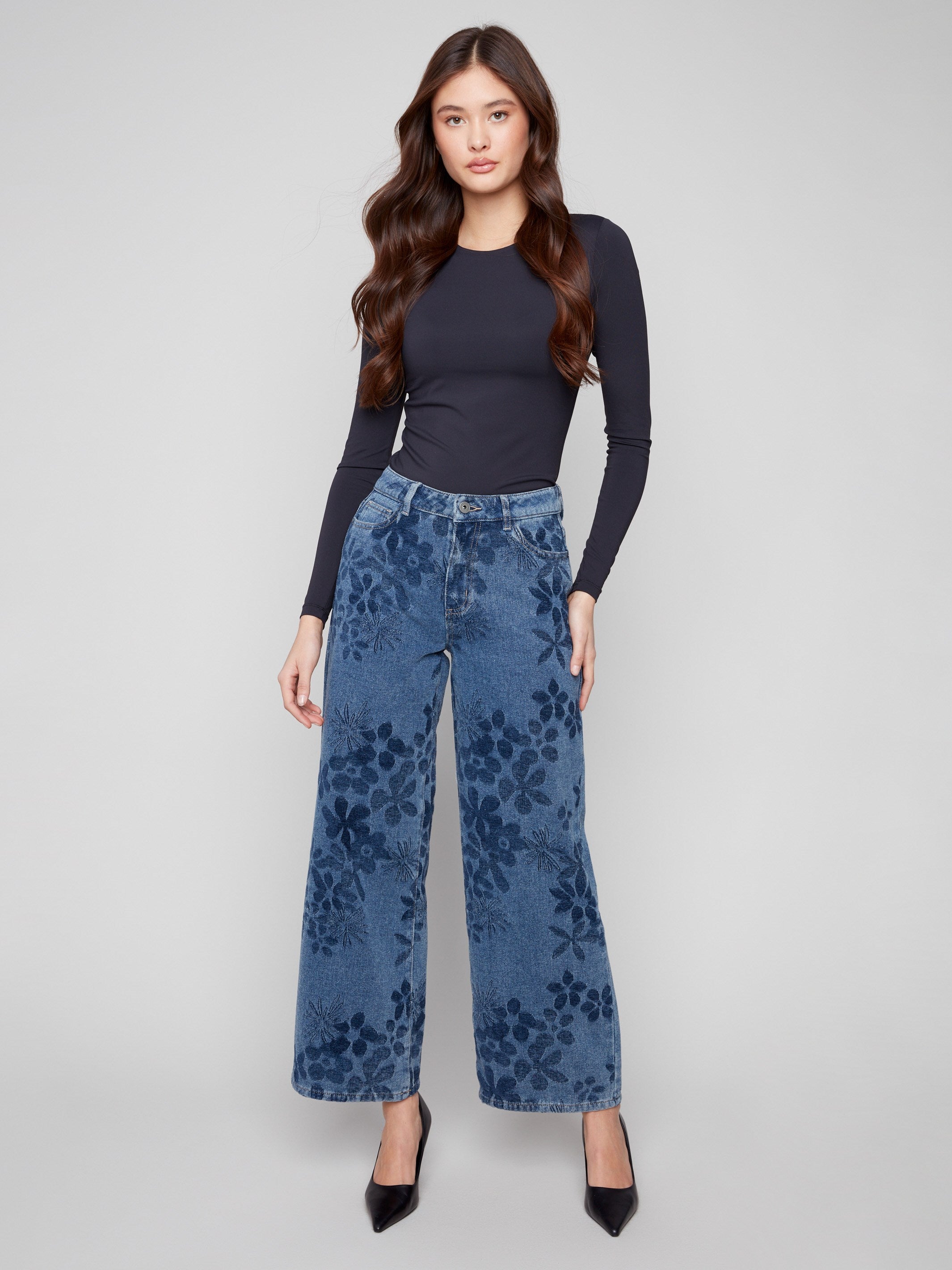 Blue jeans with a wide-leg cut, featuring a unique floral jacquard pattern and regular rise, offering elegance by Charlie B.