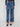 These jeans showcase a long length with an intricate floral jacquard design, perfect for versatile styling by Charlie B.