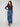 Featuring a five-pocket design, these blue jeans combine functionality and fashion with their floral patterns by Charlie B.