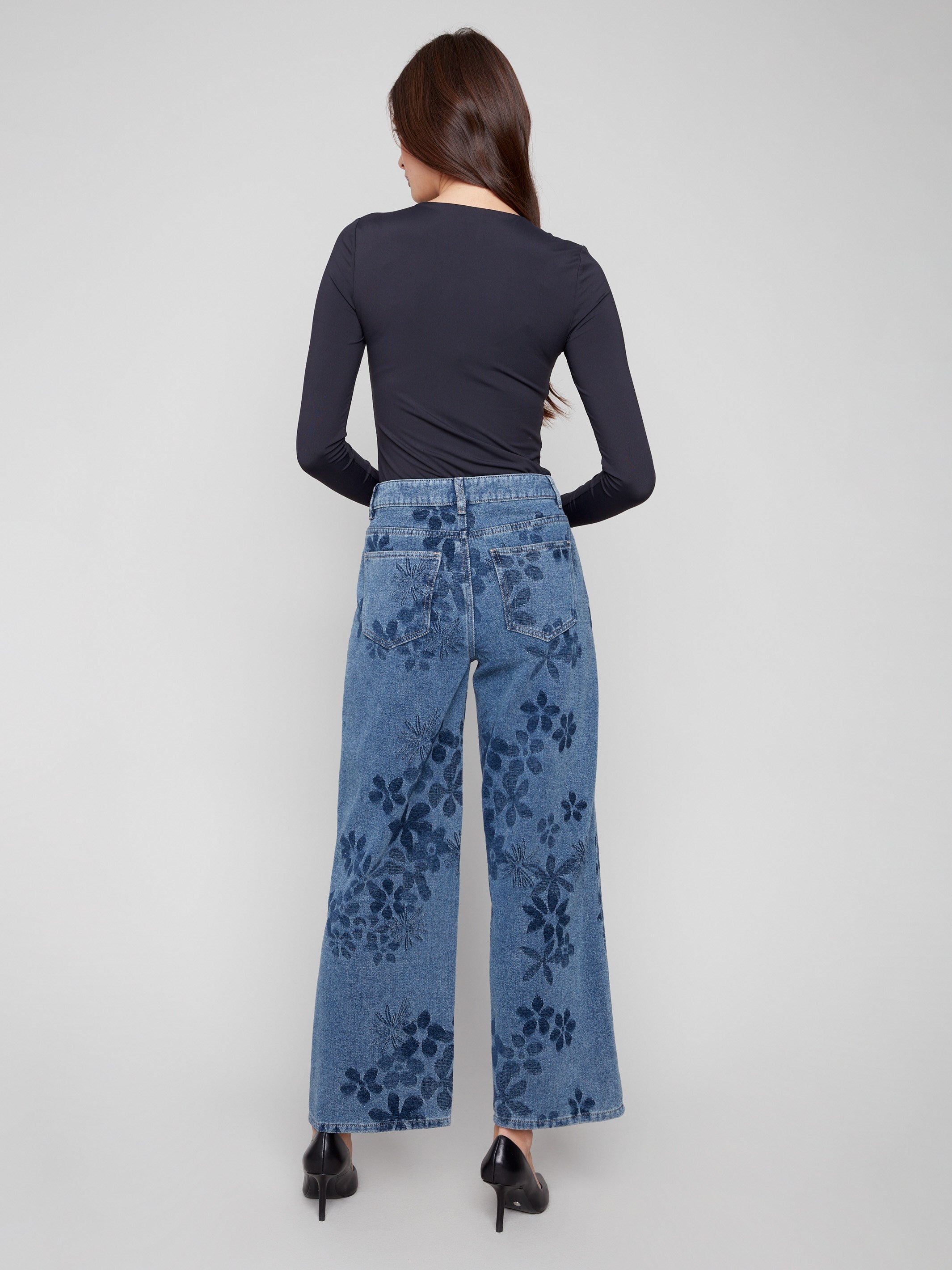 The regular rise of these blue jeans ensures comfort while the floral jacquard adds a stylish touch to your look by Charlie B.