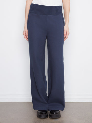 Regular rise pants with zip side pockets for added functionality and style. By Charlie B.