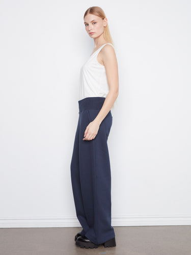Crafted from a soft cotton blend, these wide leg trousers offer both comfort and elegance. By Charlie B.