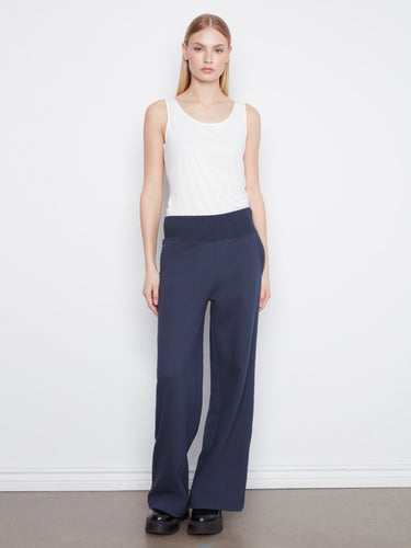 Designed with back patch pockets, these pants provide both utility and fashion-forward appeal. By Charlie B.