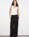 Black wide-leg French terry pants featuring a regular rise and zip side pockets, perfect for comfort by Charlie B.
