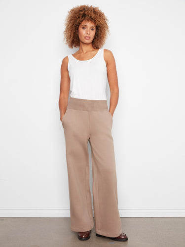 These pants feature a wide leg design, offering a chic and comfortable style for any occasion. Crafted by Charlie B.