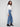 Long length wide-leg jeans in blue with charming heart details for a playful yet chic look by Charlie B.