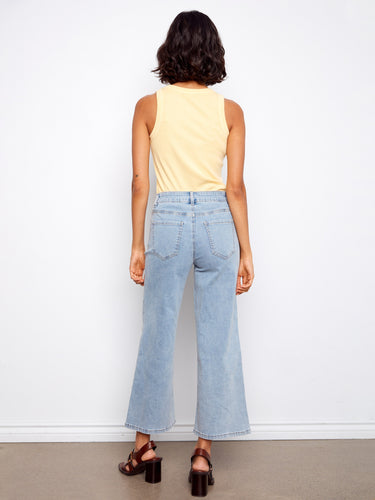 Chic cropped-length jeans highlighted by their unique pixelated flower embroidery and comfortable fit in stretch denim by Charlie B.