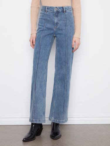 These full-length jeans offer a classic silhouette with modern appeal. By Charlie B.