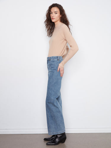 Jeans with distinctive front seam detail, adding a touch of sophistication to any look. By Charlie B.