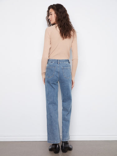 Stylish back patch pockets enhance the casual elegance of these denim jeans. By Charlie B.