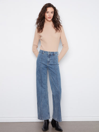 Crafted from stretch denim, these jeans ensure flexibility and ease of movement. By Charlie B.