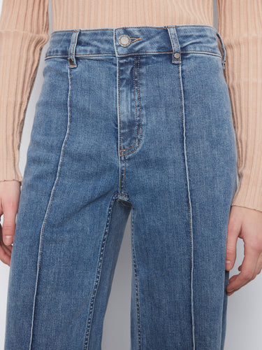 Designed with a regular rise, these jeans provide timeless style and comfort in one piece. By Charlie B.