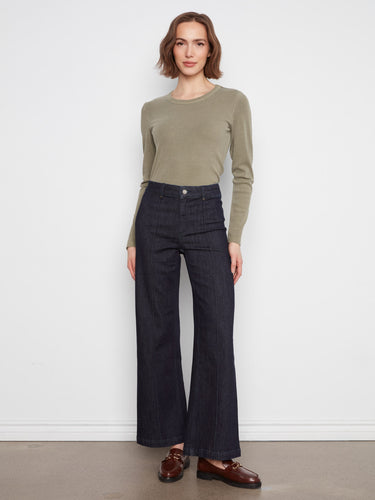 These jeans feature an extra-wide leg design, offering a chic and modern look by Charlie B.