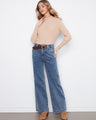 These jeans feature a full-length design, offering a classic look with versatile styling options. By Charlie B.