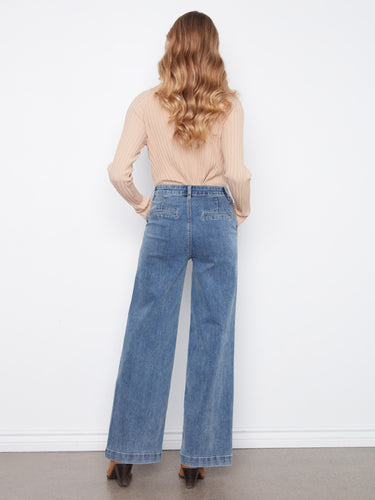 The removable front belt detail adds a customizable touch to these chic denim jeans. By Charlie B.