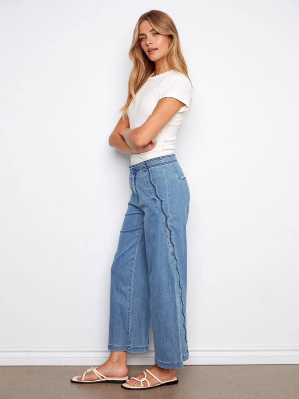 Jeans in soft blue with scalloped edges and a flattering fit, enhanced by the wide-leg cut by Charlie B.