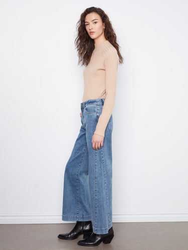 Side panel detail enhances the chic look of these wide leg jeans by Charlie B.