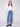 Medium blue jeans featuring a wide leg design with elegant patterned studs, crafted from stretch denim material by Charlie B.