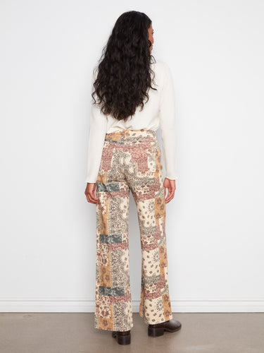 Full-length wide leg pants in stretch twill fabric, adorned with an eye-catching bandana print design by Charlie B.