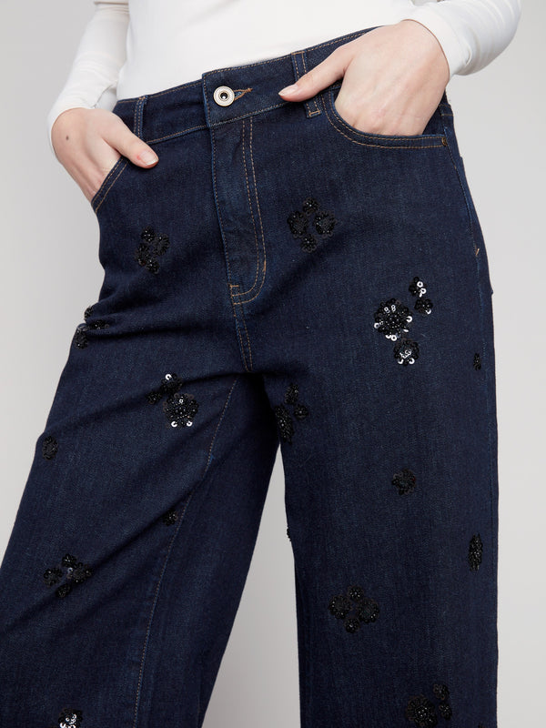 Stylish five-pocket design on these deep blue jeans, perfect for carrying essentials with ease by Charlie B.