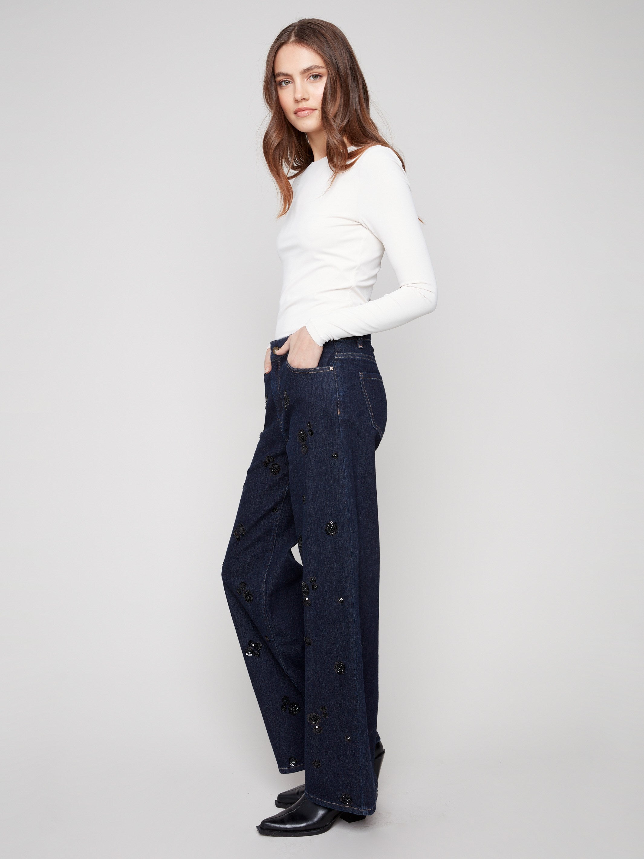 Crafted from stretch denim, these jeans offer both flexibility and style, embellished with sequins by Charlie B.