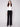 Black wide-leg pants featuring a long length and crafted from stretch corduroy for comfort by Charlie B.