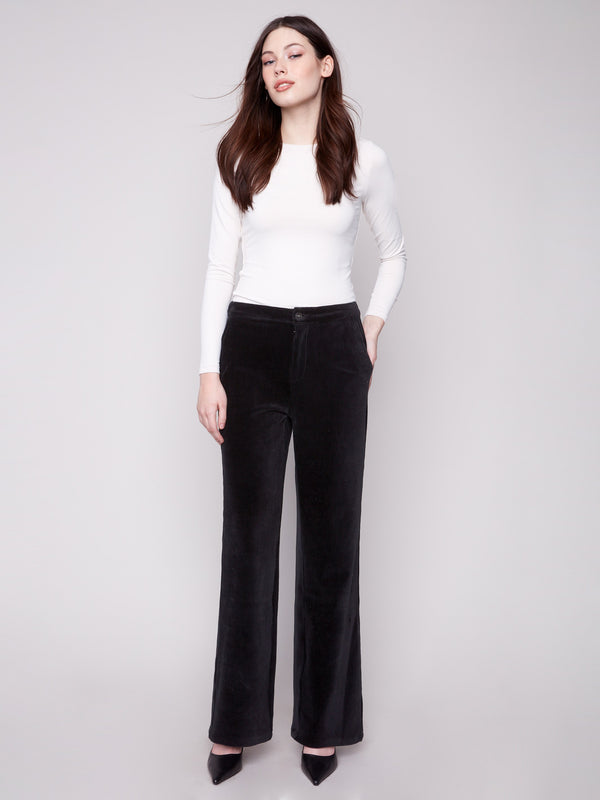 Black wide-leg pants featuring a long length and crafted from stretch corduroy for comfort by Charlie B.