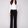 Black wide-leg pants featuring a long length and crafted from stretch corduroy for comfort by Charlie B.