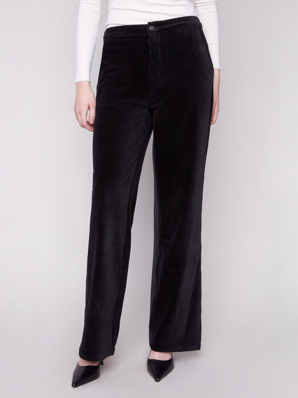 These black pants offer side and back pockets, combining style with functionality by Charlie B.