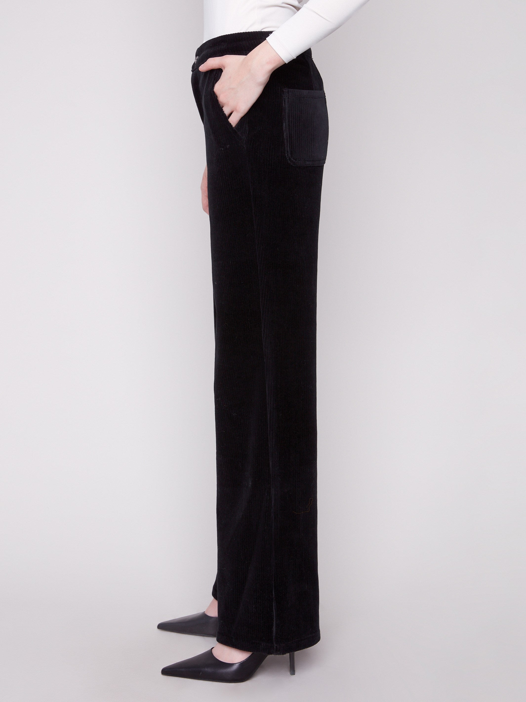 Crafted in stretch corduroy, these black pants provide a regular rise for everyday wear by Charlie B.