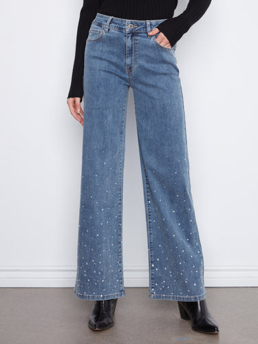 These jeans are adorned with a rhinestone-embellished hem, adding a touch of sparkle to your everyday look by Charlie B.
