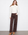 Brown wide-leg pants with a full-length cut and delicate floral embroidery, crafted from stretch twill fabric by Charlie B.