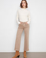 Latte twill pants with a regular rise, styled with a white top and brown boots. The stretch fabric ensures comfort by Charlie B.
