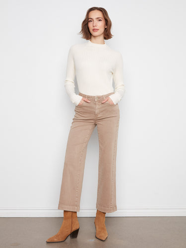 Latte twill pants with a regular rise, styled with a white top and brown boots. The stretch fabric ensures comfort by Charlie B.