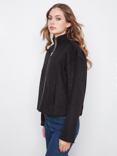 Stay cozy with the slash pockets on this stylish wool blend jacket. By Charlie B.