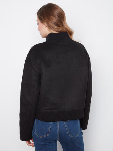 Crafted from a luxurious wool blend, this jacket offers both warmth and style. By Charlie B.