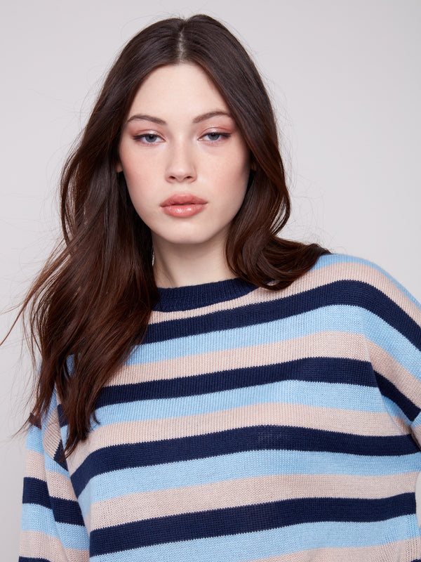 Soft knit sweater with navy stripes, designed with a classic crew neck for versatile wear by Charlie B.