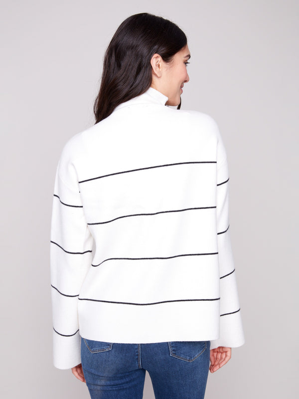 Stylish ecru sweater with funnel neck and classic black stripe pattern by Charlie B.