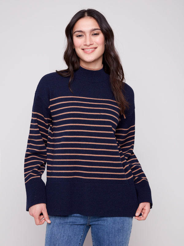 Navy blue striped sweater featuring a cozy mock neck, perfect for chilly days. Crafted with care by Charlie B.