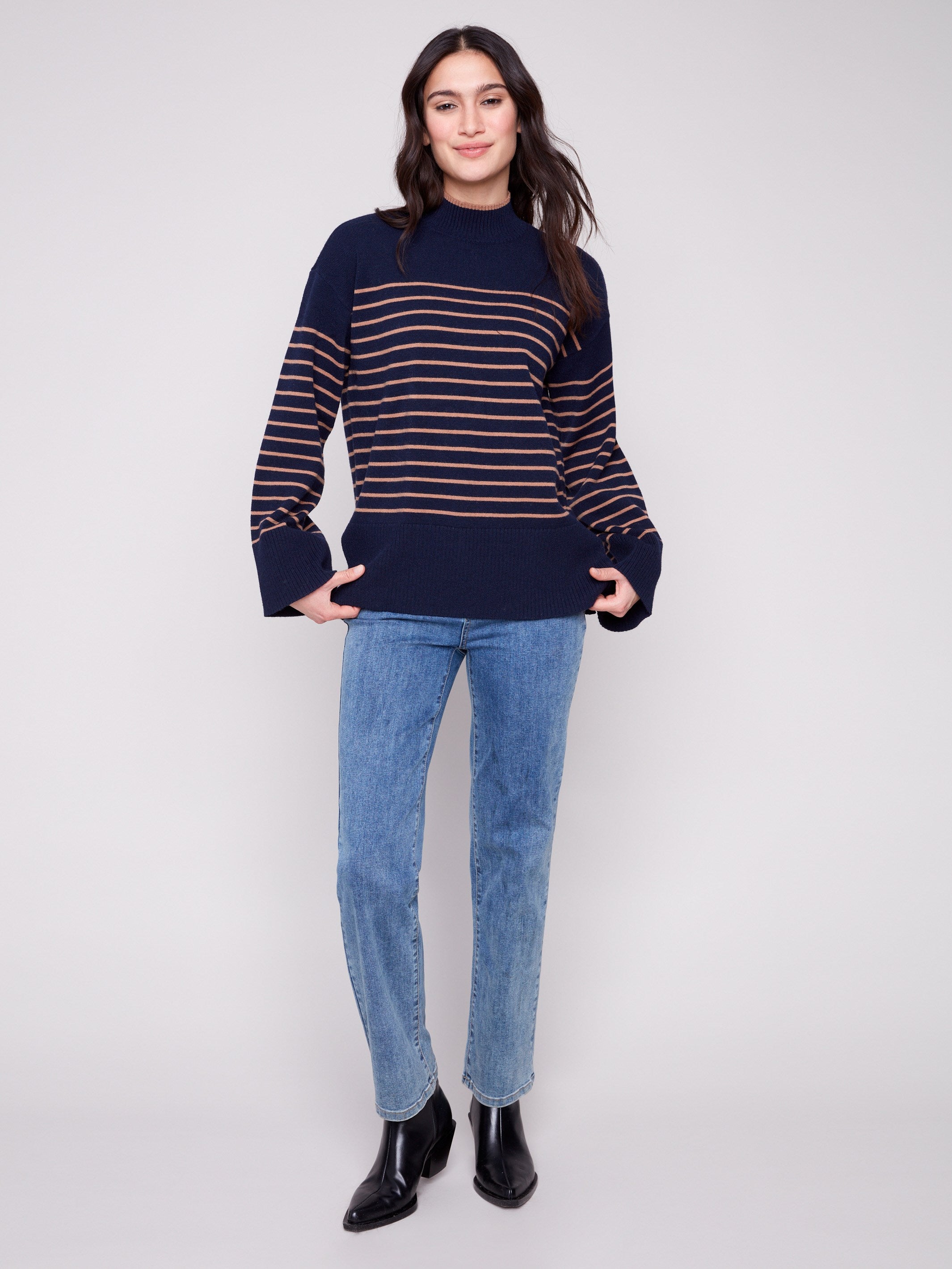 Stylish mock neck sweater in navy blue with charming side slit details, expertly crafted by Charlie B.